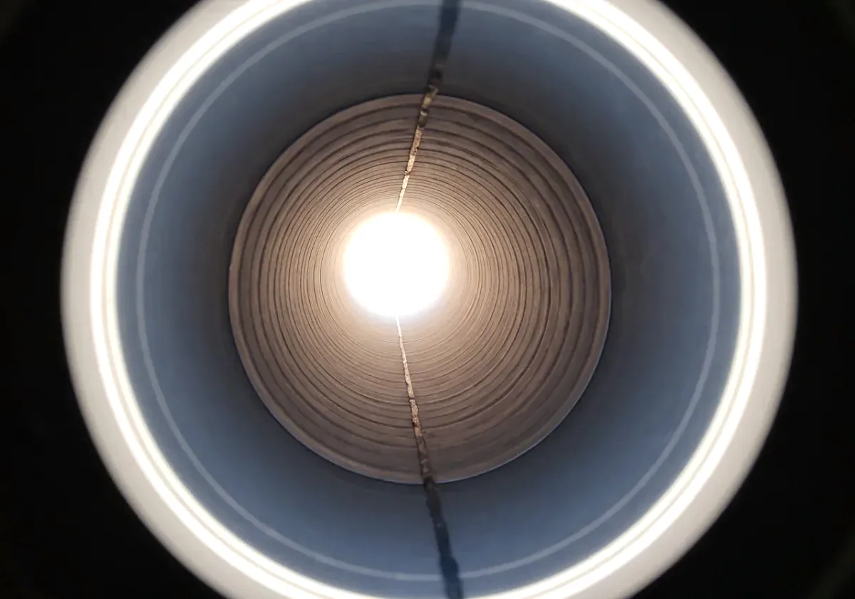 After — chimney inspection: The flue camera finds the cracks a look up from the firebox never would.